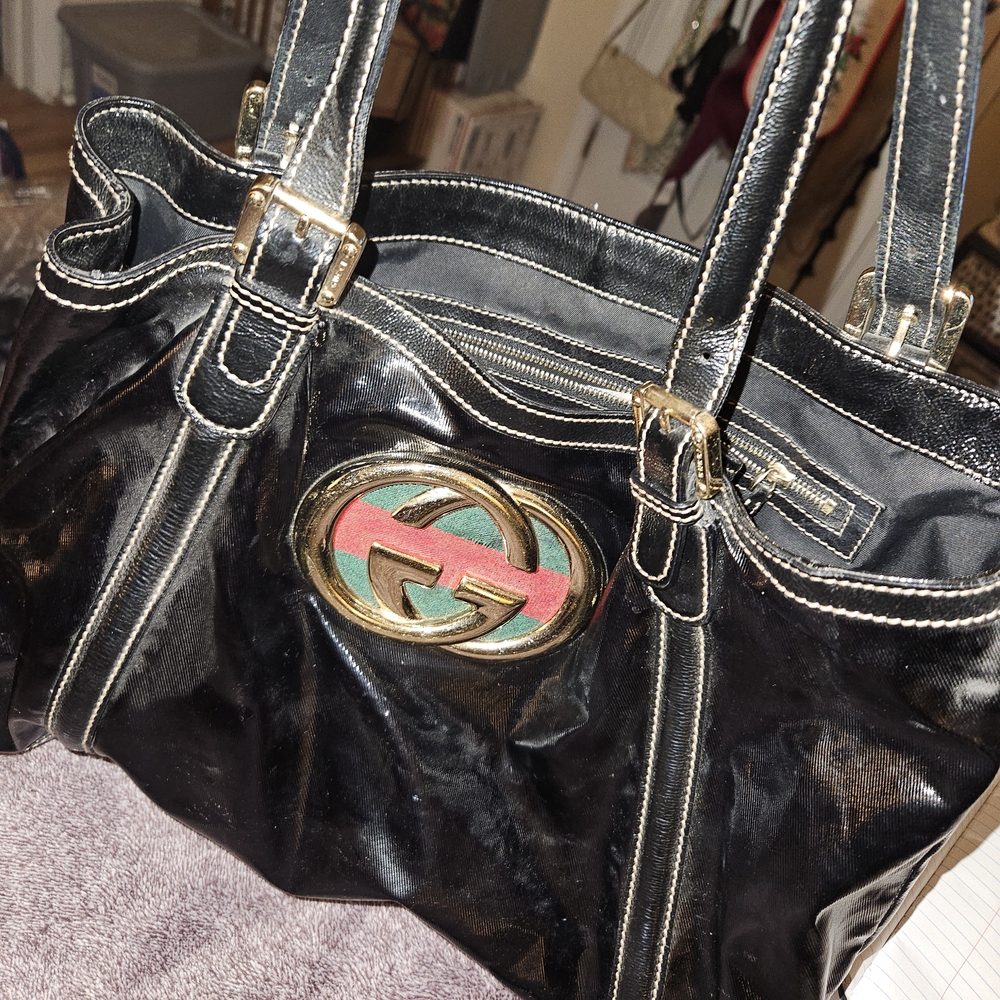 Black and Gold Shoulder Bag with Structured Design